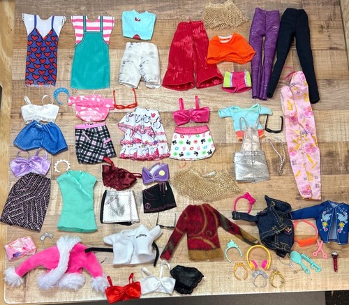 Assorted doll clothes - assorted,